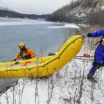 Jose Camacho hauls the raft uphill.